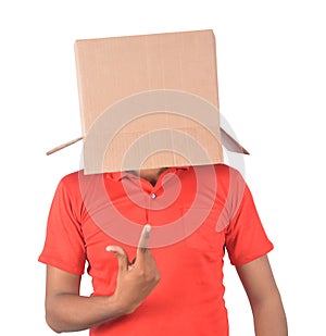 Young man gesturing with a cardboard box on his head isolated on