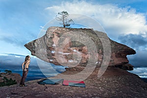 Young man getting ready for climbing