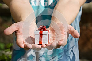 Young man with gift box