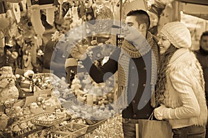 Young man with girlfriend at X-mas market