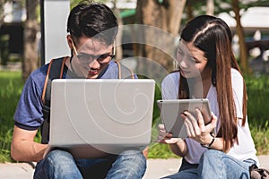 Young Man and girls friend classmates sitting consult