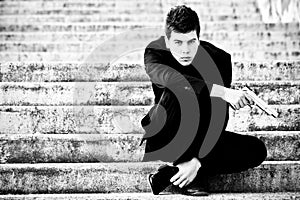 Young man with a gun