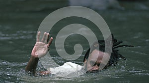 A Young Man Half Drowned Asking For Help in The River