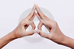 Young man hand gestured funny eye showing symbol