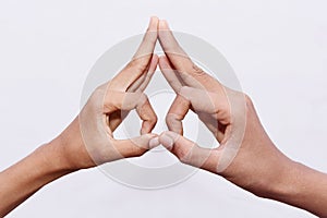 Young man hand gestured funny eye showing symbol photo