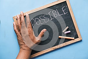 young man hand over impossible text .