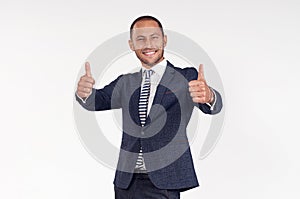 A young man is happy to lift his arms up. The guy is surprised.