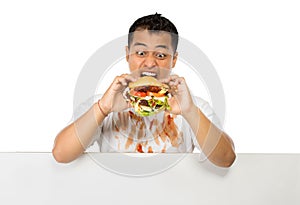 Young Man have a great desire to eat a burger