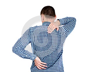 Young man having back pain. on white