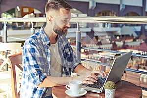 Young man having coffee break