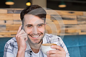 Young man having cup of coffee