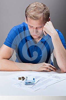 Young man having financial problems