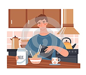 Young man having a healthy breakfast with cereal