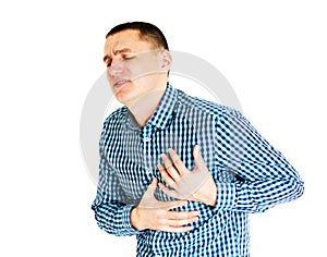 Young man having heart pain. Isolated on white