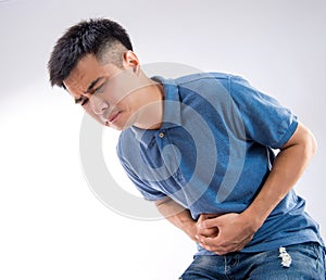 Young man having a stomachache