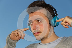 Young Man with Headphones Music photo