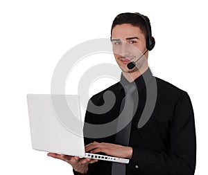 Young Man with Headset Holding Laptop