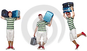 The young man with heavy suitcases isolated on white