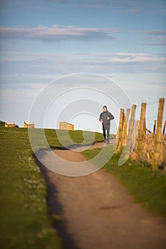 Young man on her evening jog