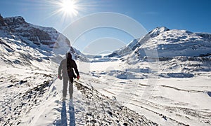 Young man hiking at Athabasca Glacier