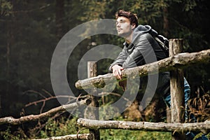 Young man hiking in the forest