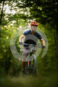 Young man with his mountain bike