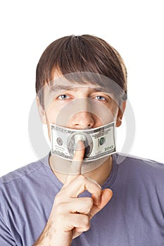 Young man with his mouth sealed by a hundred dollar bills