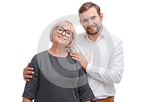 Young man and his profesor woman on a white background photo