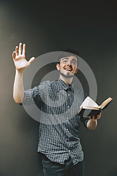 Young man holding a bible, Student with  book