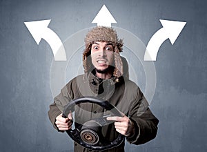 Man holding steering wheel