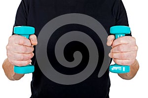 Young man holding blue dumbbells