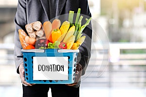 Young man holding Donation food donate Charity