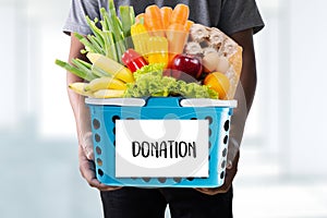 Young man holding Donation food donate Charity