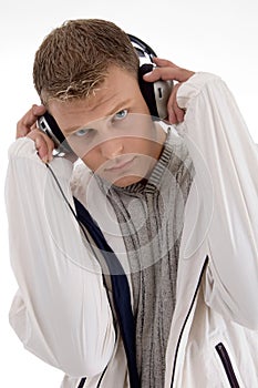 Young man holding the headphone