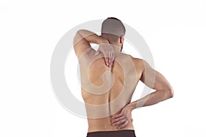 Young man holding his neck in pain. Medical concept