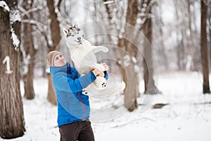 Man holding a puppy