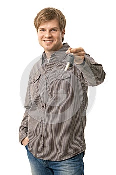 Young man holding ignition keys photo