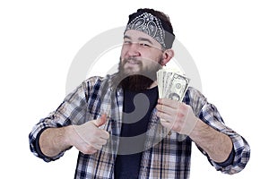 Young man holding money with thumbs up