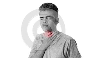 Young man holding the neck isolated on white background.