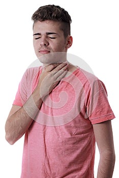 Young man holding the neck isolated on white background.