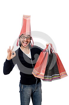The young man holding plastic bags