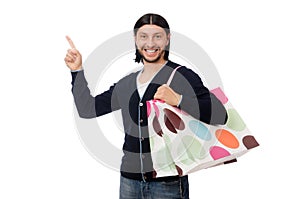 Young man holding plastic bags isolated on white