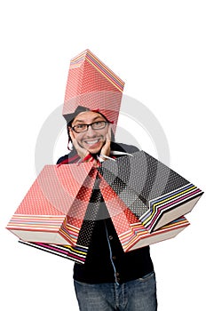 Young man holding plastic bags isolated on white