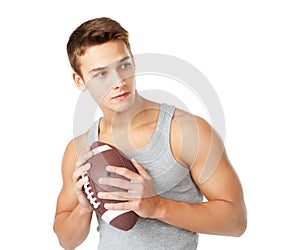 Young man holding rugby ball