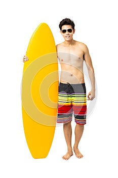 young man holding surfboard