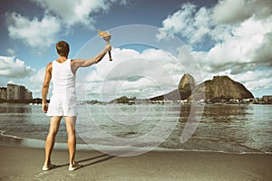 Young Man Holding Torch Rio de Janeiro