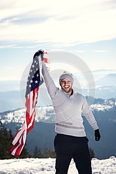 Young man holding USA flag