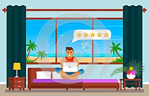 A young man on holiday in Egypt, in the hotel room rates the quality of service at the hotel for 5 stars. Positive feedback on the