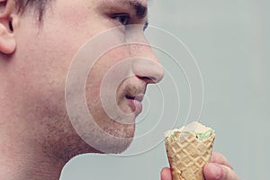 Young man with ice cream