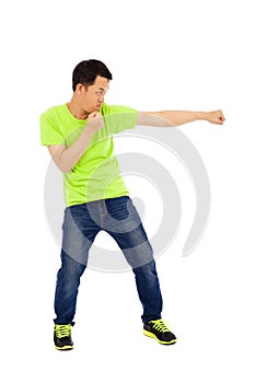 Young man imitate boxing pose